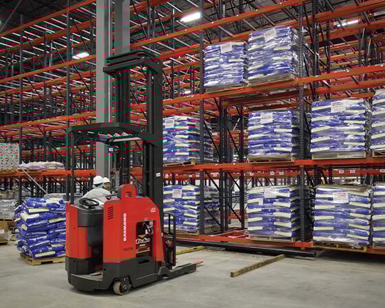 Employees moving products container