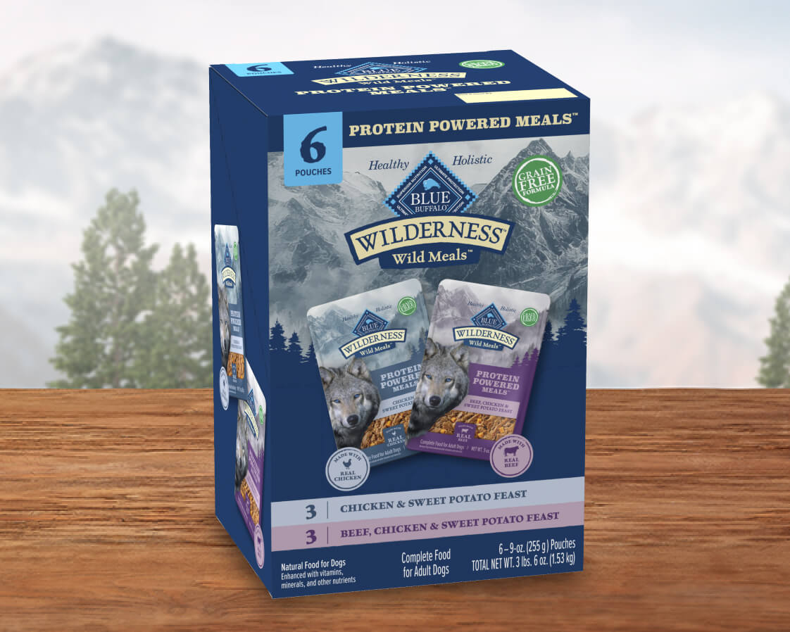 A variety box of BLUE Wilderness Wild Meals with Chicken & Sweet Potato and Beef, Chicken & Sweet Potato recipes.