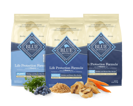 Three Blue Buffalo Life Protection Formula dog food bags: Puppy, Adult, and Senior Chicken and Brown Rice Recipe