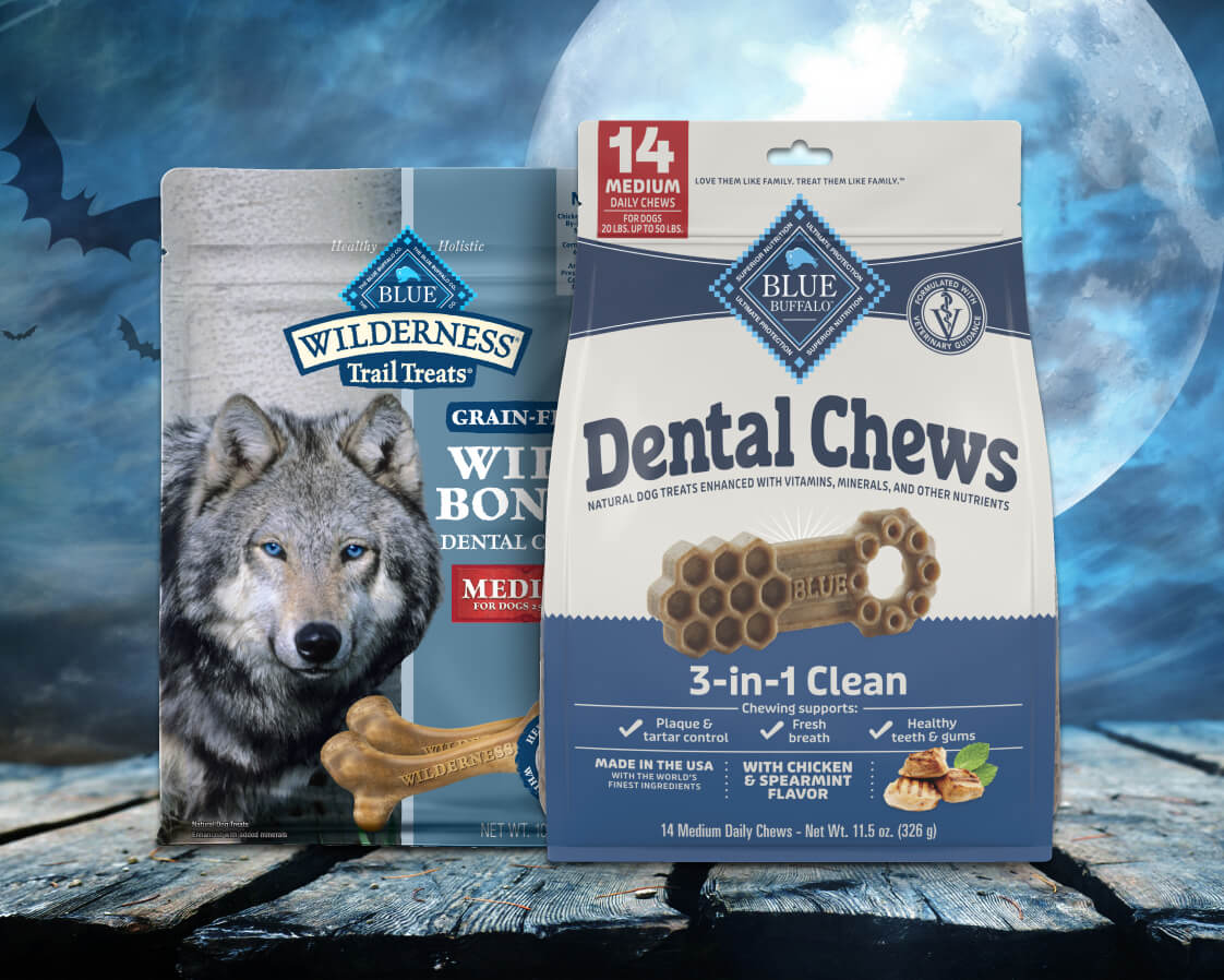 Blue Buffalo dental chews for dogs with Halloween-themed packaging, promoting healthy teeth and gums with natural ingredients.