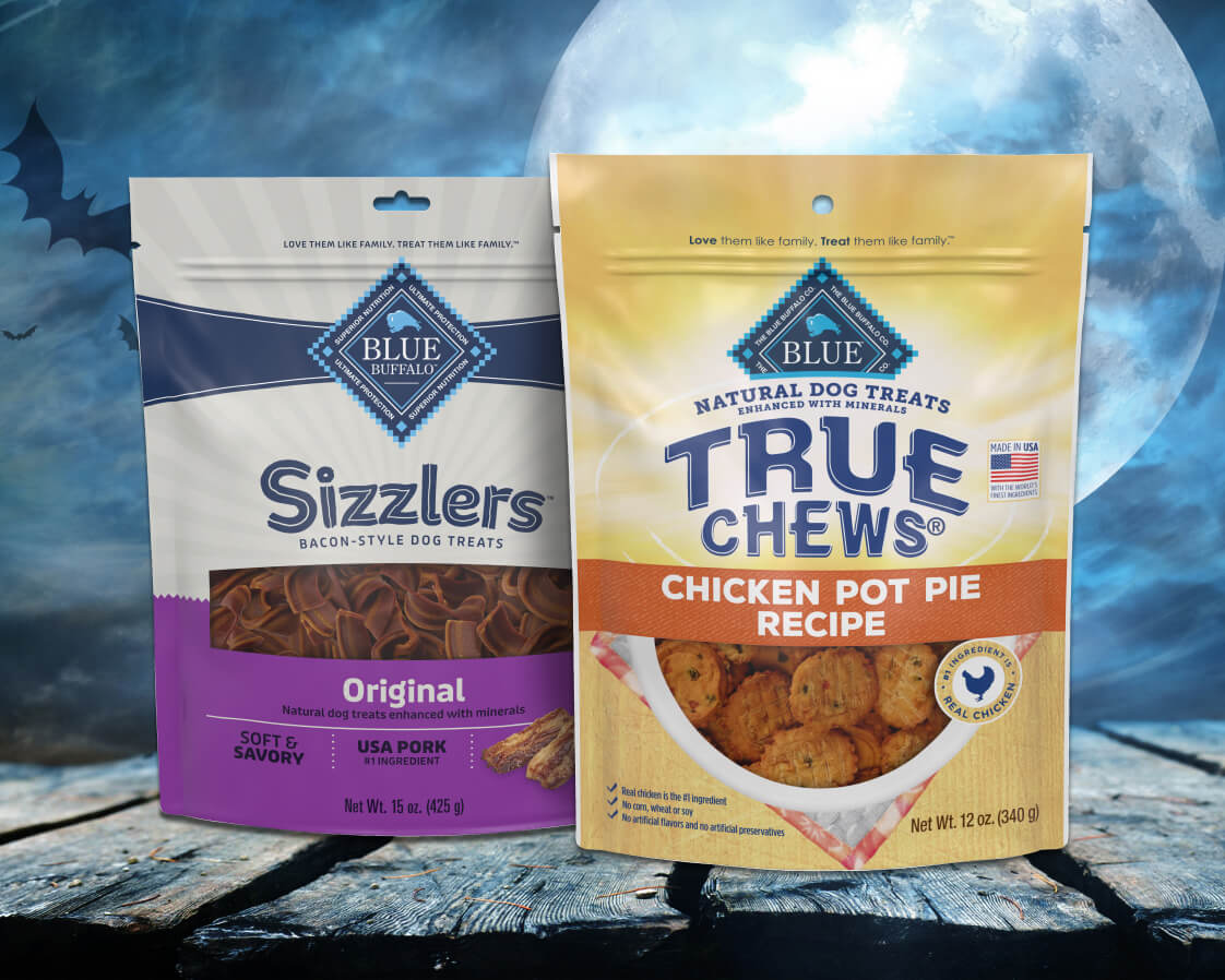 Blue Buffalo Homestyle dog treats packaging with a Halloween-themed design, featuring natural ingredients and homestyle flavor.
