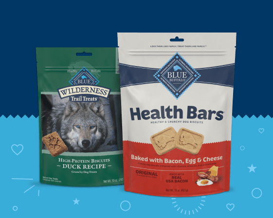 Two Blue Buffalo dog treat packages featuring Health Bars biscuits and Wilderness Trail Treats crunchy biscuits.