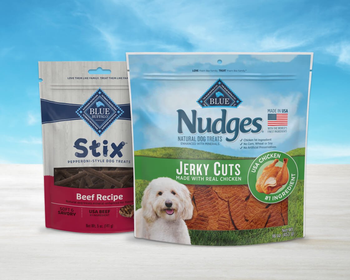 Bags of pepperoni-style Stix and savory Nudges Jerky Cuts dog treats food