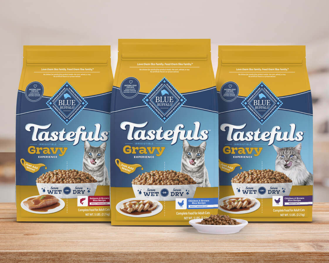 Three Blue Buffalo Tastefuls cat food bags with gravy, salmon and chicken flavors