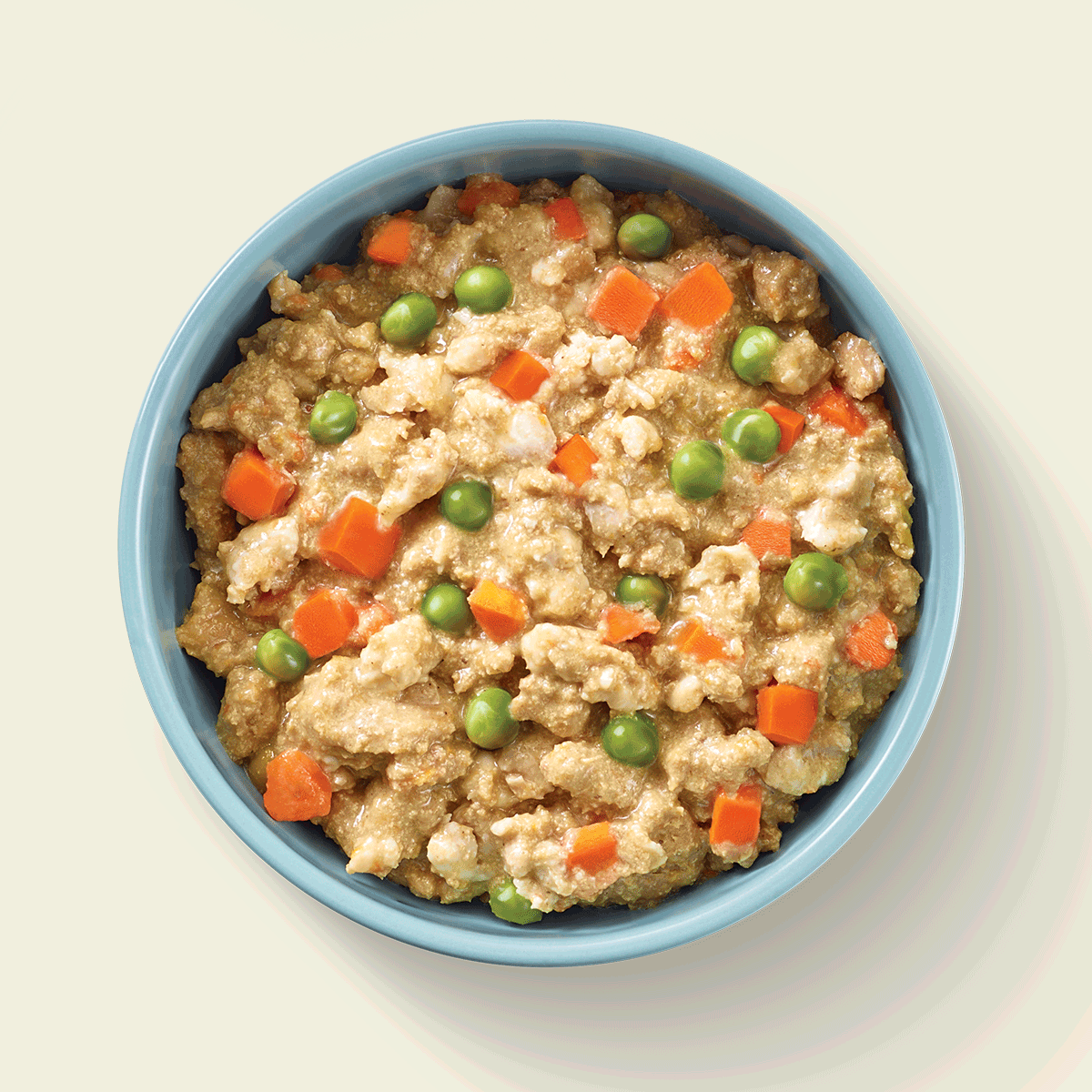 A gif of dry dog food being layered with fresh dog food, then fresh dog food alone in a light blue bowl.