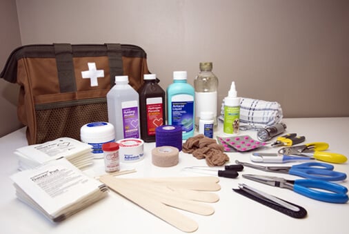 first-aid supplies laid out on a table
