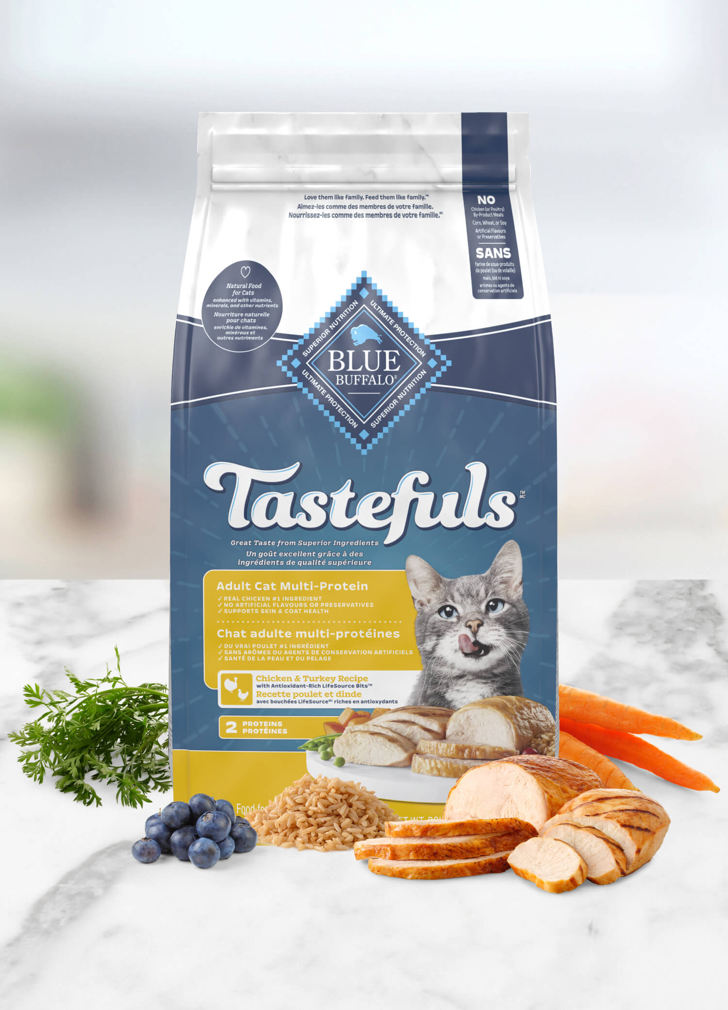 Bag of Tastefuls adult cat food with chicken, carrots, rice, and blueberries on a white surface.