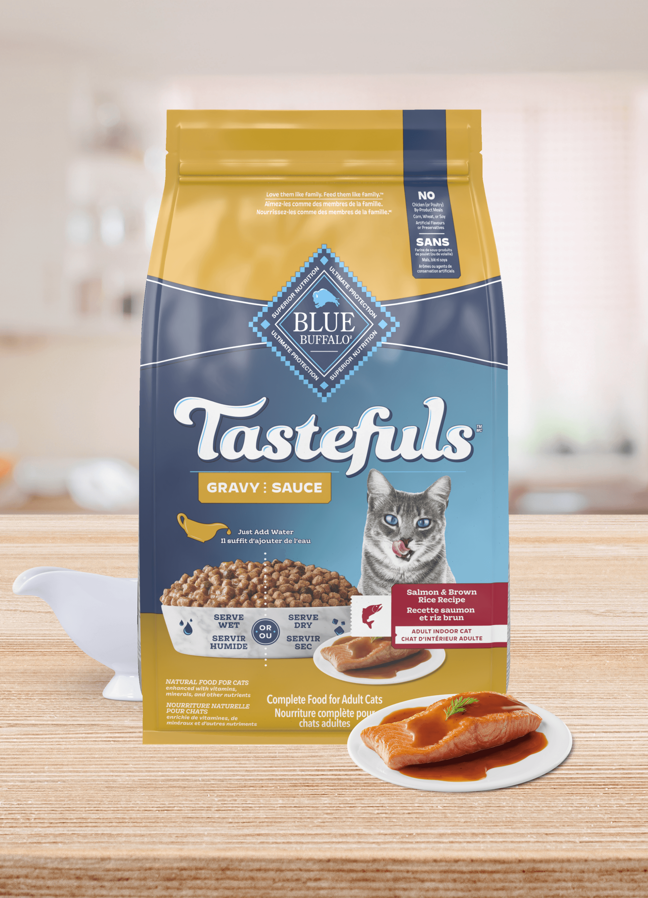 A bag of Tastefuls Gravy cat food rests on a kitchen counter with a small dish of food in front.