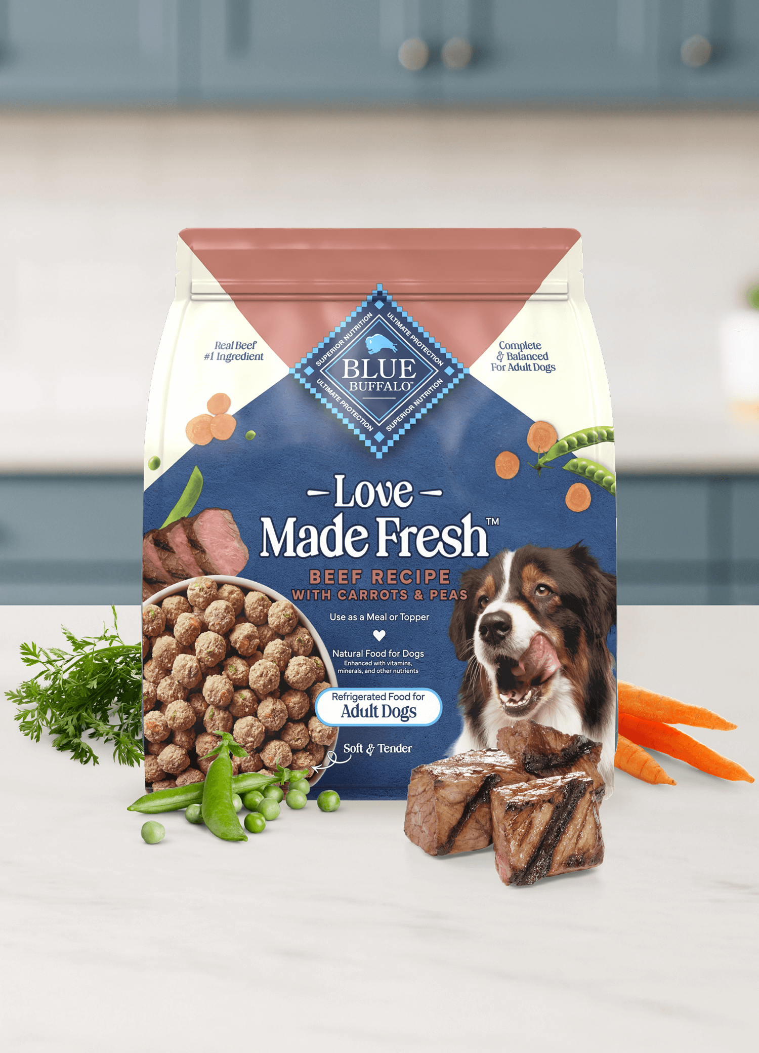 A bag of beef recipe dog food with carrots, peas, and steak pieces sits on a kitchen counter.