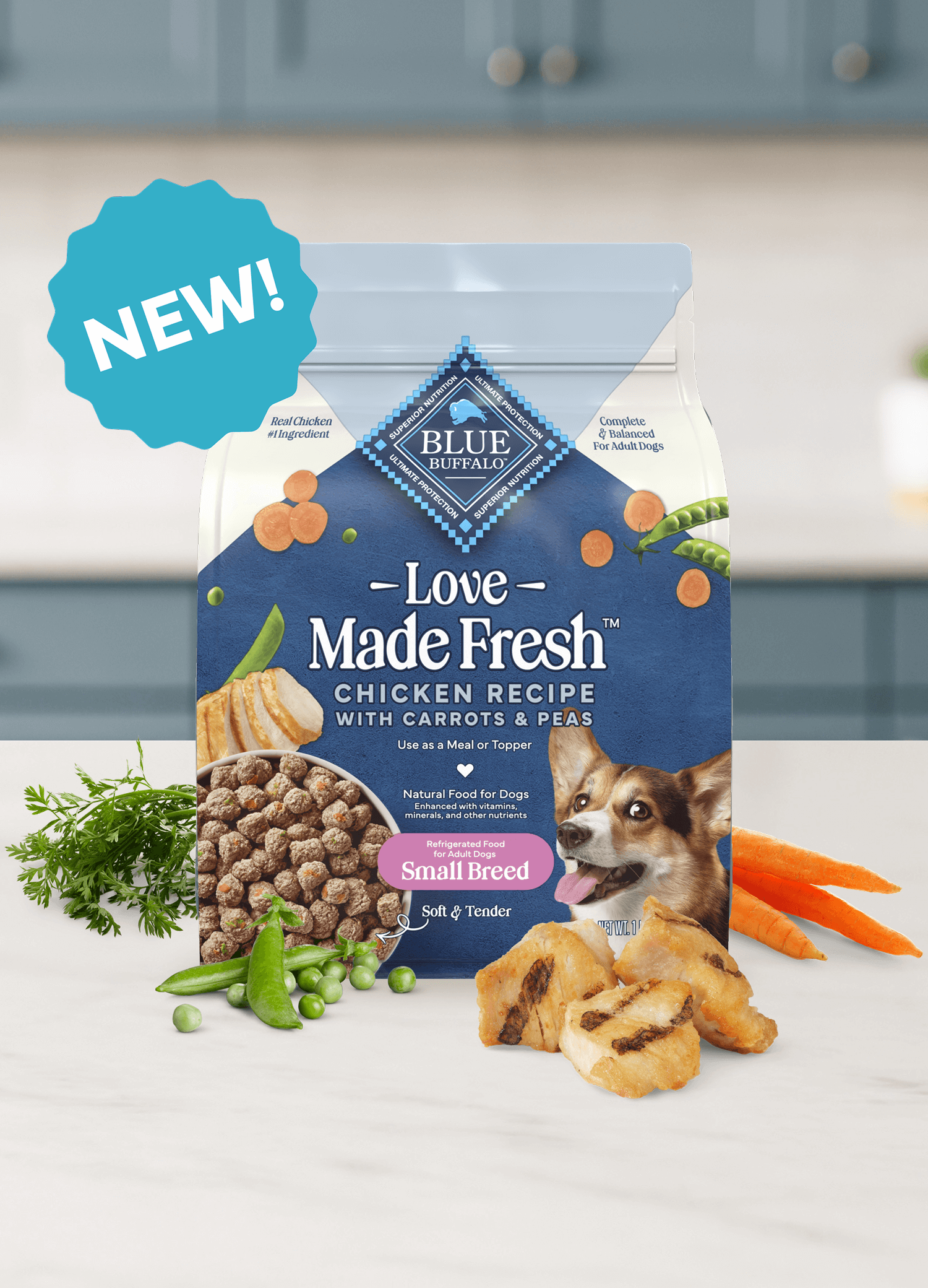 A bag of Love Made Fresh chicken dog food with peas, carrots, and real chicken pieces beside it.