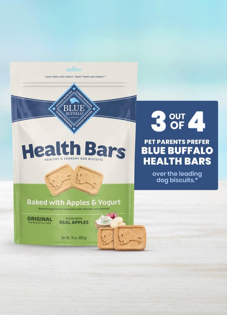 A bag of Health Bars dog biscuits with apples and yogurt, next to two biscuits and a swirl of yogurt.