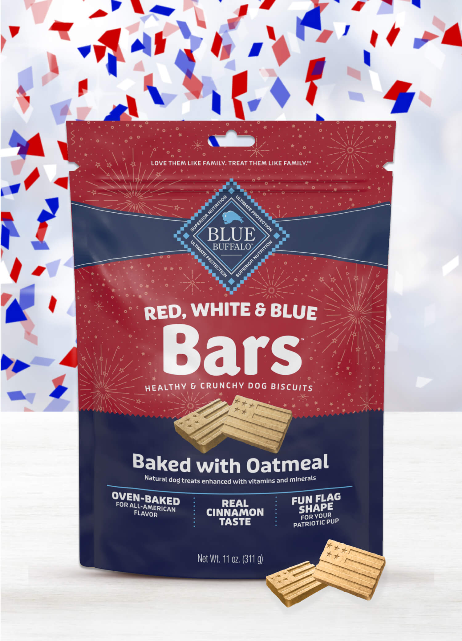 Bag of patriotic-themed dog biscuits with oatmeal, on a light surface, surrounded by confetti.