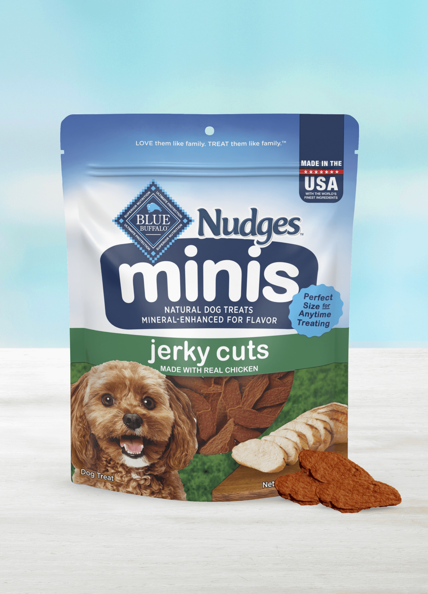 A pack of BLUE Nudges minis jerky cuts made with real chicken and a few loose Nudges mini treats.