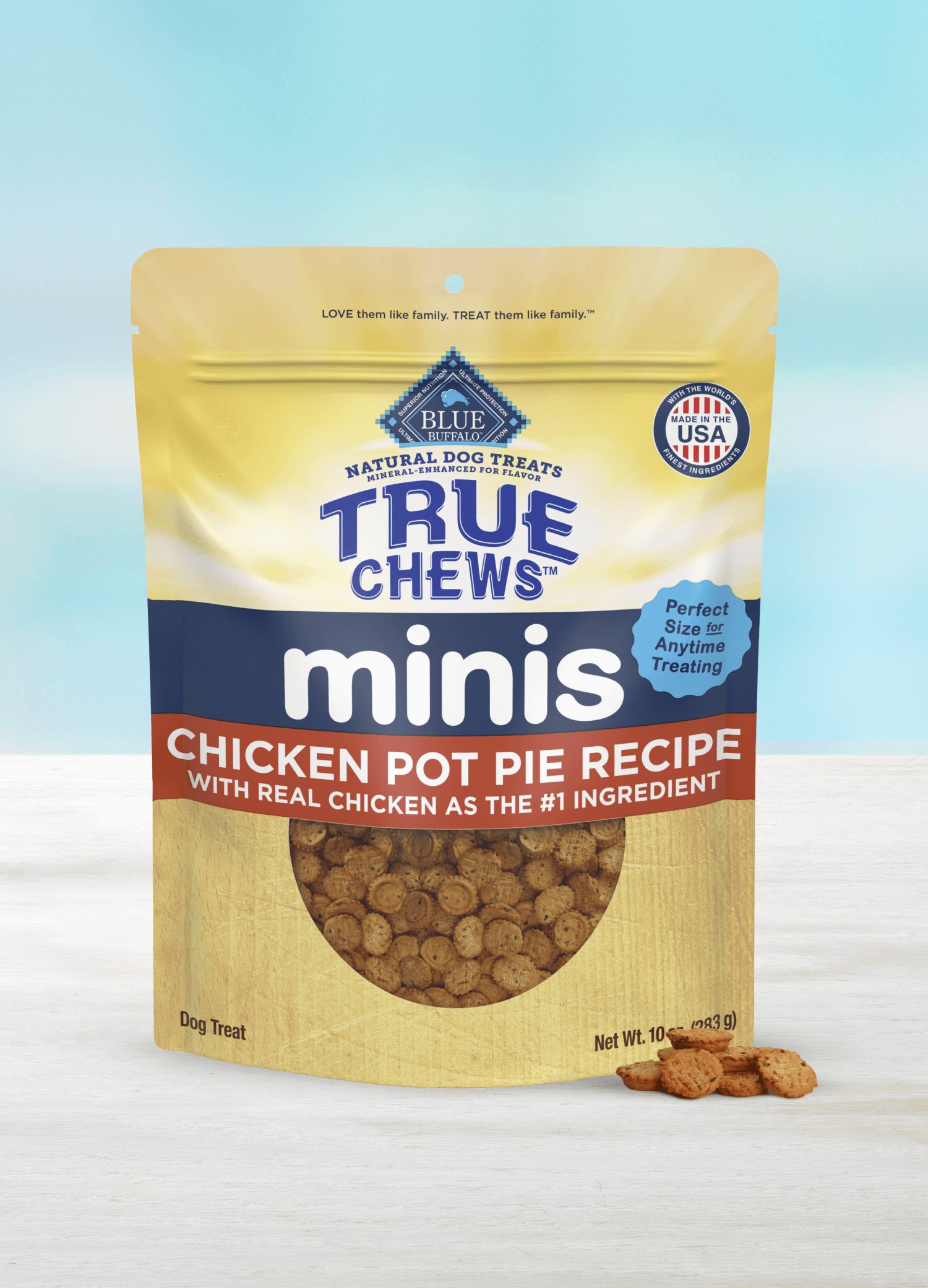 A pack of BLUE True Chews minis chicken pot pie dog treats made with real chicken and a few loose True Chews mini treats.